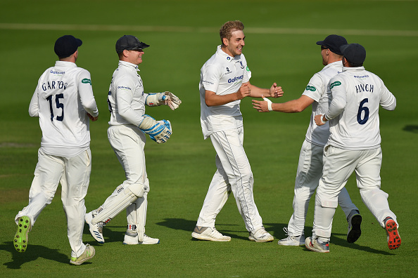 Jared Warner celebrates