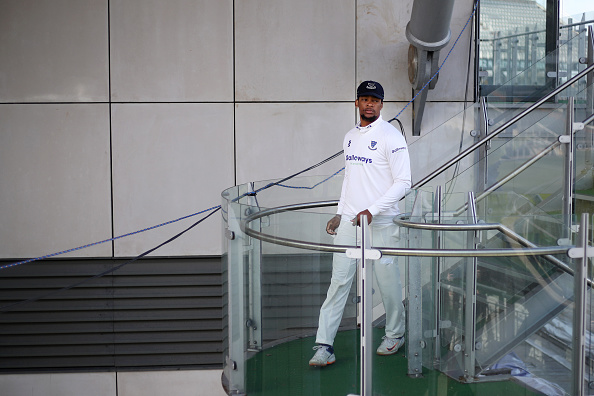 Delray Rawlins makes his way down to the pitch at Emirates Old Trafford