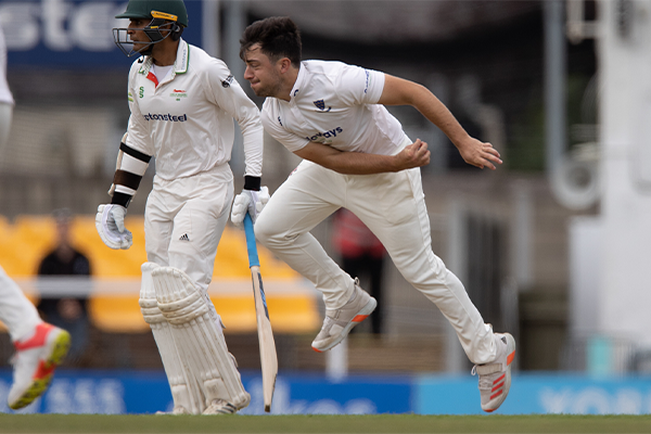 Haines bowling against Leicestershire