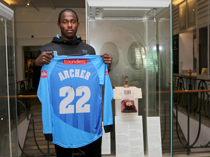 Jofra with his shirt in the museum