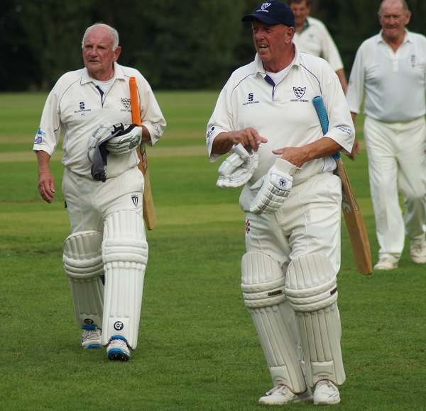 Peter Crees and Andy Barnes lead the teams off after Sussex's victory