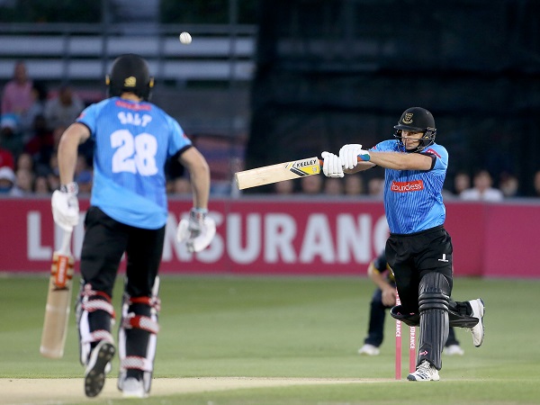 Luke Wright cuts Phil Salt looks on