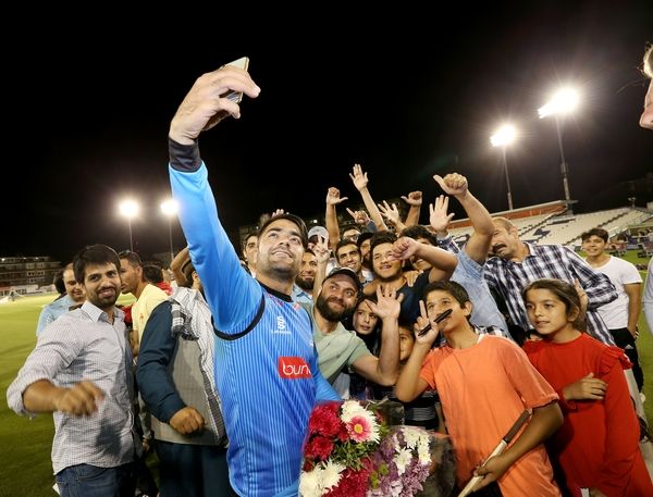 Rashid Khan and supporters